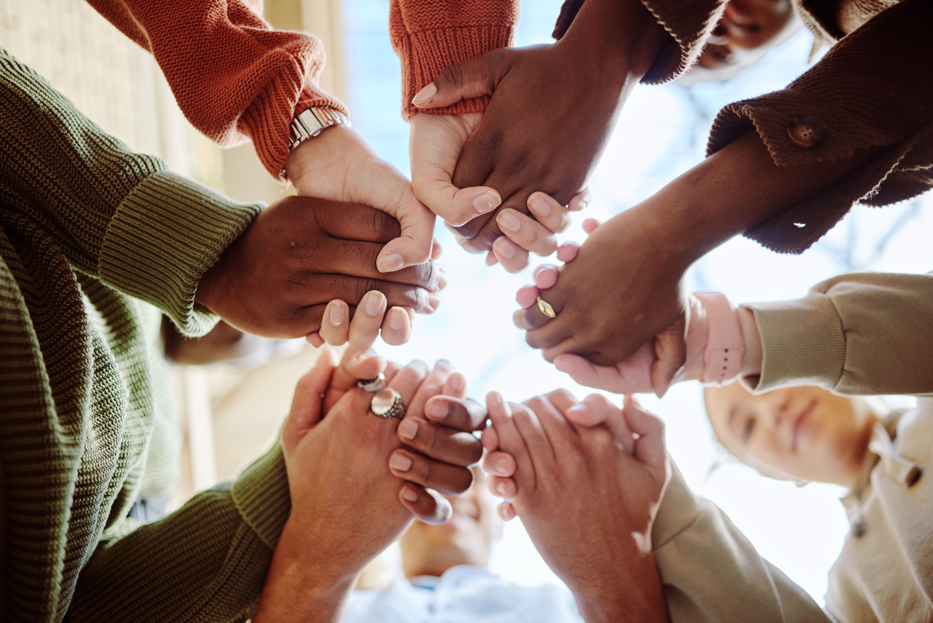 Seniors, veterans, adults, holding hands for support, motivation or education in campus community. Diversity, friends and motivation for learning with teamwork, studying or scholarship at college together